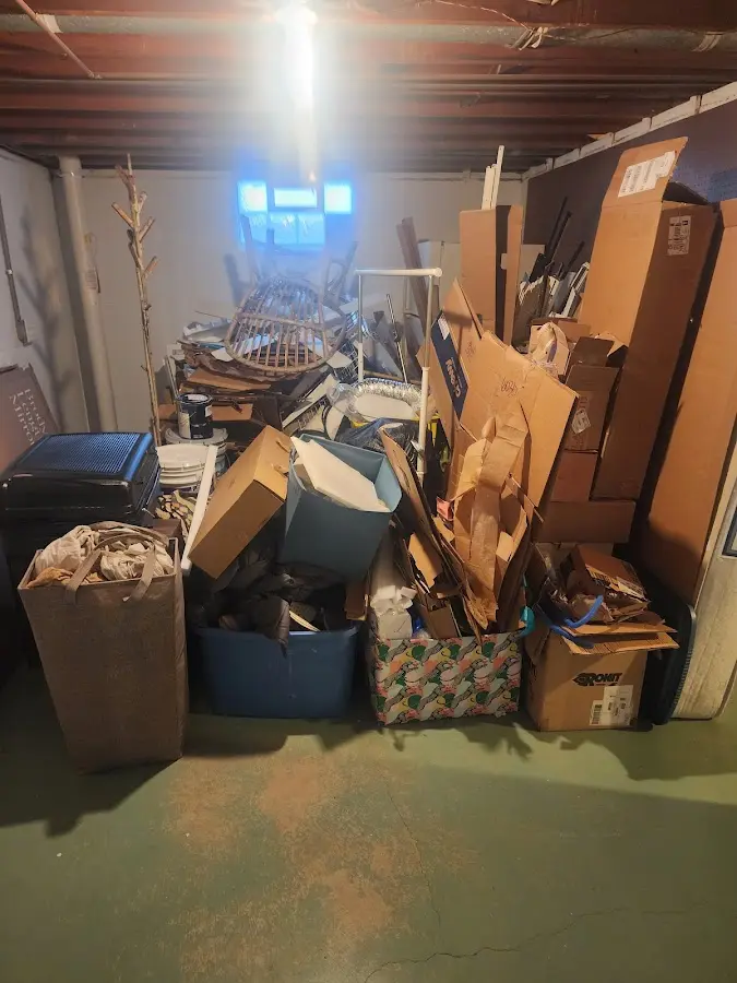 Roll-off dumpster container at job site for 2 Yard Dumpster Rental in Painesville